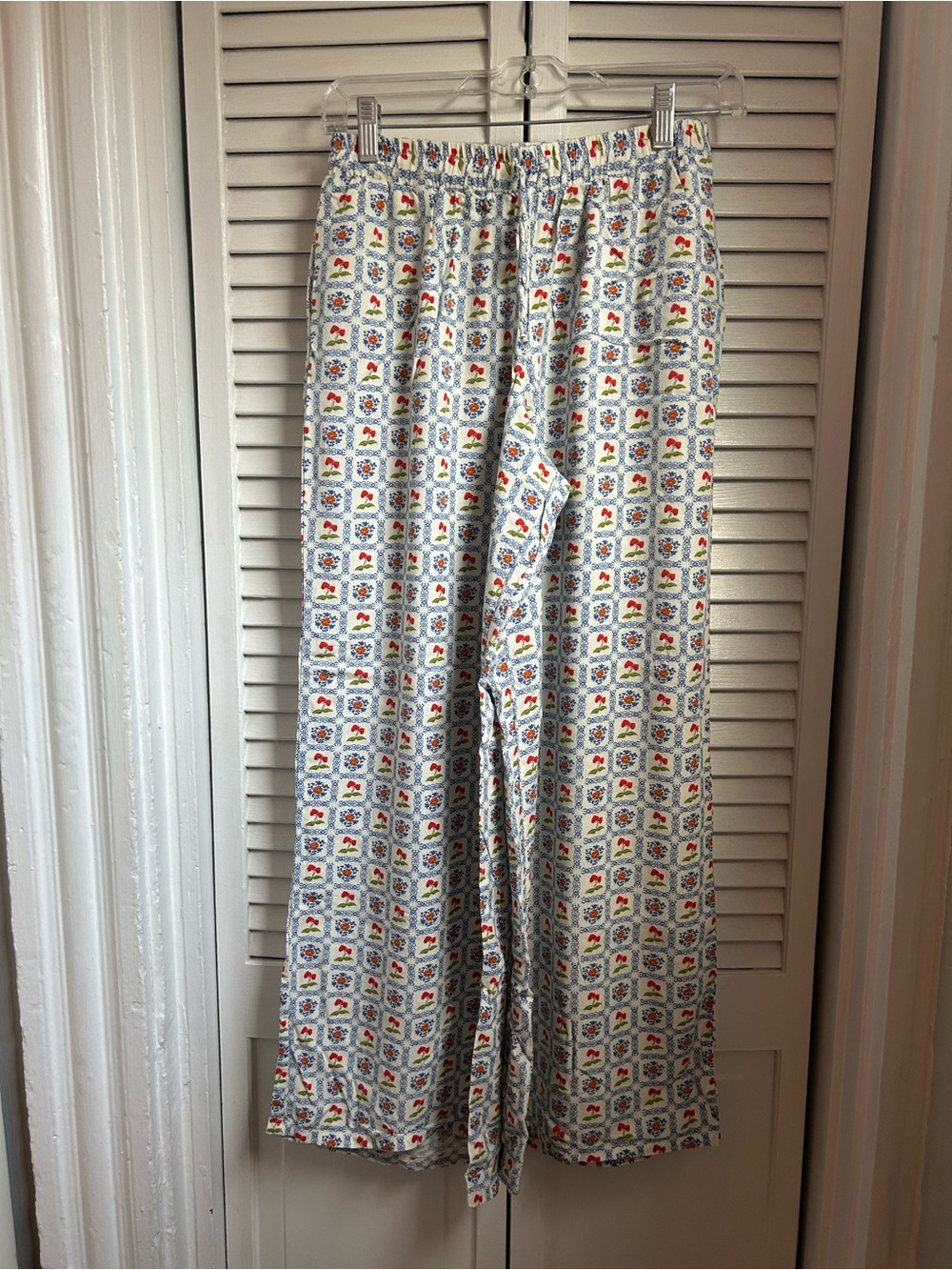 Dippin' Daisy's White Wide-Leg Pants with Blue and Red Floral Tiles